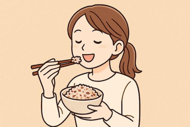 雑穀入り金賞の一膳ごはんを美味しく食べる女性
